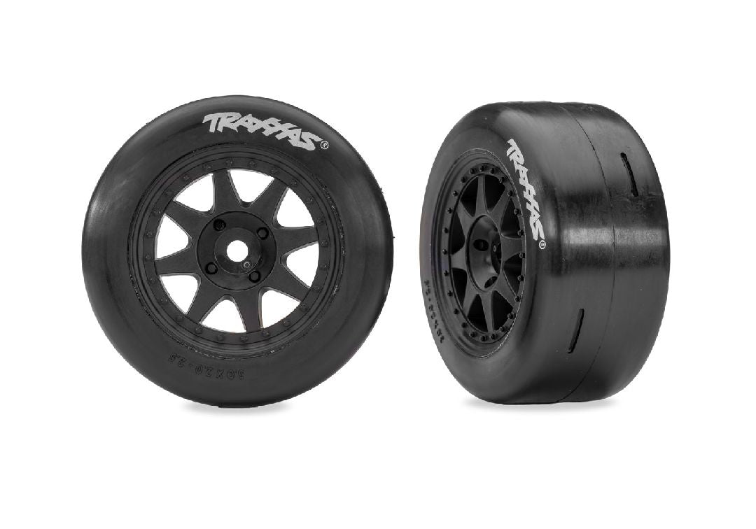 Traxxas Tires & wheels, assembled, glued (black wheels, dual profile (2.0" outer, 2.6" inner), Speed Slicks tires) (hard compound, front) (2)